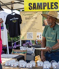 Don Haight Jr. from Culpeper shares samples of his Heirloom Black Garlic.