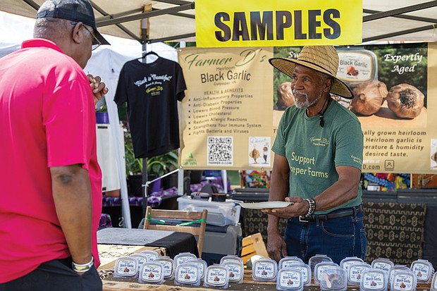 Don Haight Jr. from Culpeper shares samples of his Heirloom Black Garlic.