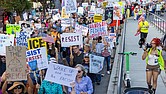 Demonstrators head west on Broad Street during the “Workers Over Billionaires” Labor Day March in Richmond on Monday, Sept. 1. After remarks from local activists and community members at Monroe Park, the march, co-sponsored by RVA Indivisible and the 50501 Movement, proceeded to Lombardy Street, then Franklin Street, and returned to Monroe Park.