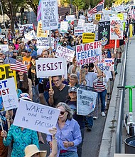 Demonstrators head west on Broad Street during the “Workers Over Billionaires” Labor Day March in Richmond on Monday, Sept. 1. After remarks from local activists and community members at Monroe Park, the march, co-sponsored by RVA Indivisible and the 50501 Movement, proceeded to Lombardy Street, then Franklin Street, and returned to Monroe Park.