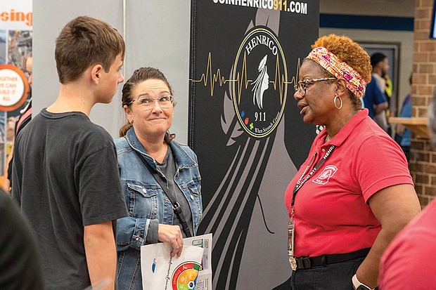 Attendees speak with representatives from local employers at Henrico’s Life- Ready Expo in 2024.