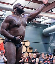 Phill Brown acknowledges the crowd after his fight against Isaiah Frazier on Friday at Hardywood in Richmond.