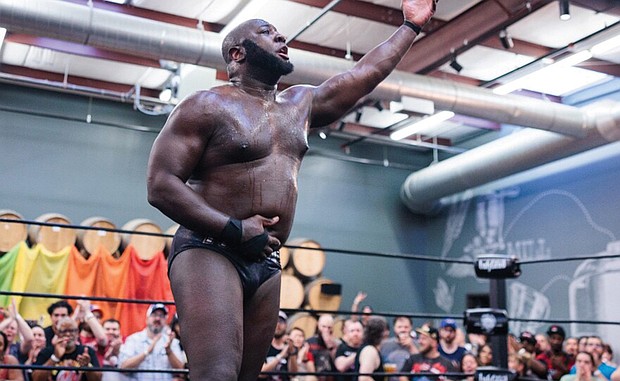 Phill Brown acknowledges the crowd after his fight against Isaiah Frazier on Friday at Hardywood in Richmond.