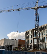 The rear of the future VPM building on Broad Street in downtown Richmond is under construction Tuesday, Sept. 2. The five-story, 53,000-square-foot facility is expected to open in 2026. The new headquarters will feature a visible newsroom, a street-level community studio and an event space designed to host audiences and civic programming. It is being developed on a former parking lot at 15 E. Broad St.