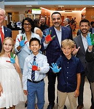 (left to right) Kevin Reilly, vice chair, Hyundai Hope on Wheels, Emmy Cole, national youth ambassador, Hyundai Hope on Wheels, Michelle Riley-Brown, MHA, FACHE, president and CEO, Children's National Hospital, Jackson Trinh, national youth ambassador, Hyundai Hope on Wheels, Randy Parker, president and CEO, Hyundai Motor North America, John Guastaferro, executive director, Hyundai Hope on Wheels, Jeffrey Dome, MD, senior vice president, Center for Cancer and Blood Disorders, Children's National Hospital at Children’s National Hospital in Washington, D.C., on Sept. 2, 2025 (Photo/Hyundai)