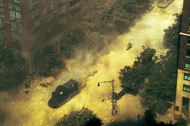 A New York Police Department vehicle and a motorcyclist speed down a street toward the World Trade Center after the North Tower's collapse on September 11, 2001. The photo was recently found on a forgotten floppy disk.
Mandatory Credit:	courtesy Dennis Lovelady via CNN Newsource