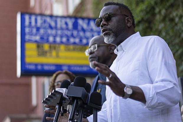 Chicago Mayor Brandon Johnson speaks during a news conference in front of Nash Elementary School in Chicago on Friday, Sept. 5.