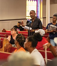 Umar Kenyatta, state director of Black Wall Street Virginia, voices concerns about the Richmond Redevelopment and Housing Authority’s proposal to use its nonprofit arm, the Richmond Development Corporation, in the Gilpin Court community redevelopment during a discussion Sept. 6 at Greater Mt. Moriah Baptist Church.
