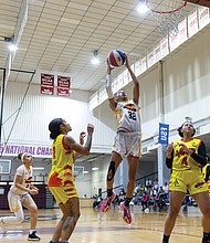 Kiera Gaines (#32) of the Richmond Roadrunners drives for a layup
against the Virginia Vitesse on Sunday, Sept. 7 at Virginia Union
University’s Barco-Stevens Hall.
