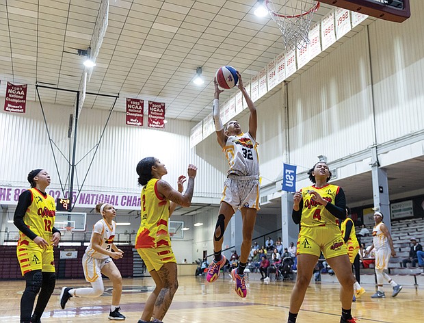 Kiera Gaines (#32) of the Richmond Roadrunners drives for a layup
against the Virginia Vitesse on Sunday, Sept. 7 at Virginia Union
University’s Barco-Stevens Hall.