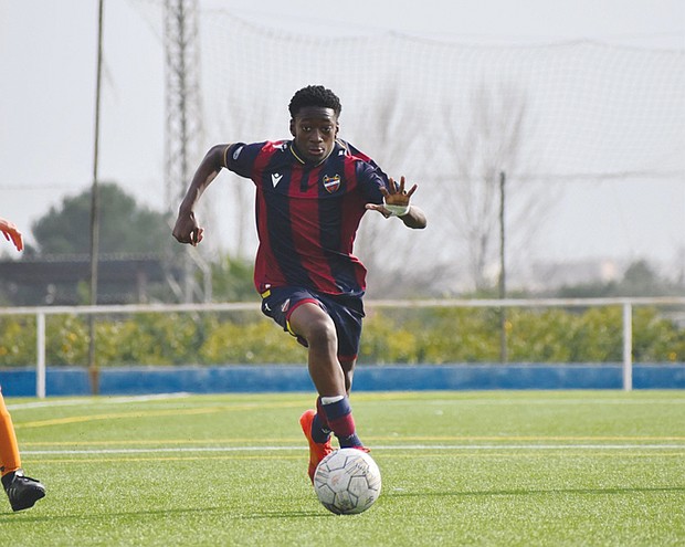 Terry Richard, 14, of Chesterfield, controls the ball during a youth soccer game. Richard is heading to Spain to train with Patacona CF in Valencia.