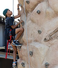 Lennox Atkins, 10, reaches new heights at The WELL Fest.
