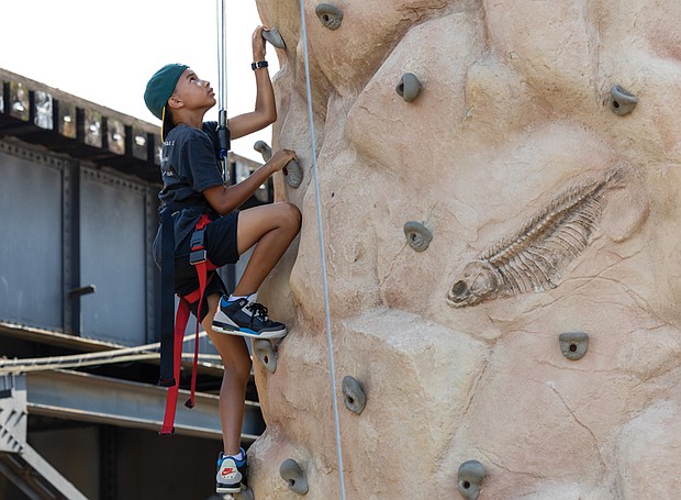 Lennox Atkins, 10, reaches new heights at The WELL Fest.