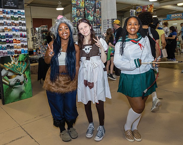 From left, Courtney Turner, 15, her friend Amber Stone, 15, and her mother, Lendora Alston, at Richmond ComiCon Sept. 6,