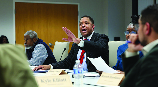 Steven Nesmith, CEO of the Richmond Redevelopment and Housing Authority, answers questions about a resolution he introduced for a vote during the RRHA Board of Commissioners meeting Wednesday, Sept. 17.