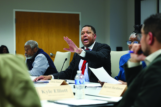Steven Nesmith, CEO of the Richmond Redevelopment and Housing Authority, answers questions about a resolution he introduced for a vote during the RRHA Board of Commissioners meeting Wednesday, Sept. 17.
