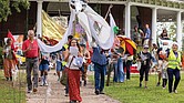Marchers make their way through Byrd Park during Richmond’s PeaceFest 2025 on Sunday, Sept. 21, a celebration of “A Day for Peace and the Planet” that combines International Sun Day and the United Nations’ International Peace Day.