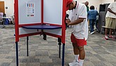 Leo Smith casts a ballot on the first day of early inperson
voting Friday, Sept. 19, at the voting location on Nine Mile Road in eastern Henrico County. The Richmond Office of Elections later reported that more than 280 incorrect ballots had been provided to voters in multiple districts.