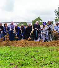 Mayor Danny Avula, Sen. Tim Kaine, Bishop Barry Knestout, Councilwoman Ellen Robertson, church members and local residents turn the first shovels of dirt at the former church site, marking the start of construction on an affordable housing community in Richmond’s North Side during Commonwealth Catholic Charities’ groundbreaking ceremony on Sunday,
Sept. 21.