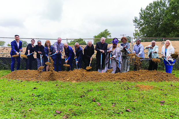 Mayor Danny Avula, Sen. Tim Kaine, Bishop Barry Knestout, Councilwoman Ellen Robertson, church members and local residents turn the first shovels of dirt at the former church site, marking the start of construction on an affordable housing community in Richmond’s North Side during Commonwealth Catholic Charities’ groundbreaking ceremony on Sunday,
Sept. 21.