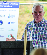 Sen. Tim Kaine, a member of St. Elizabeth’s Catholic Church, speaks during the Commonwealth Catholic Charities’ groundbreaking ceremony on Sunday,
Sept. 21.