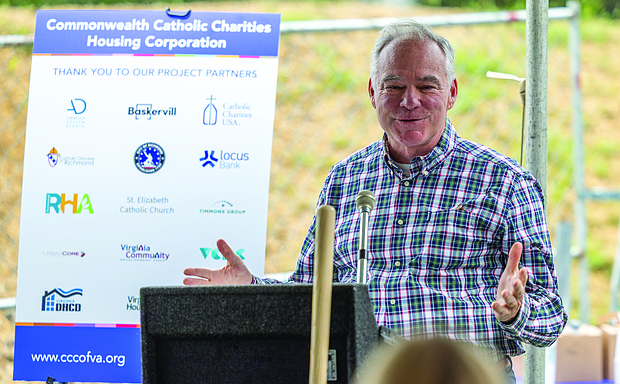 Sen. Tim Kaine, a member of St. Elizabeth’s Catholic Church, speaks during the Commonwealth Catholic Charities’ groundbreaking ceremony on Sunday,
Sept. 21.