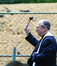 Bishop Barry Knestout of the Catholic Diocese of Richmond blesses the land of an affordable housing community in Richmond’s North Side during Commonwealth Catholic Charities’ groundbreaking ceremony on Sunday,
Sept. 21.
