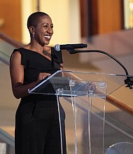 Justene Hill Edwards, winner of the 2025 Virginia Literary Award for nonfiction, speaks to the audience during the 28th annual awards at the Library of Virginia on Sept. 20. Her book, “Savings and Trust: The Rise and Betrayal of the Freedman’s Bank,” has received critical acclaim for its scholarship and insight.