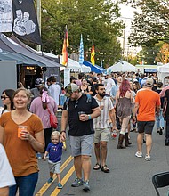 Music, food and beer flow at Oktoberfest- It wasn’t quite October, but Richmonders came out to the Museum District on Friday, Sept. 19, for the 20th annual St. Benedict’s Oktoberfest. The three-day festival features live music and dancing, a Christkindlmarkt, children’s activities, German food and beers from Germany and local breweries. Crowds pack Belmont Avenue on Friday, Sept. 19, for the opening day of the Oktoberfest.(Julianne Tripp Hillian/Richmond Free Press)