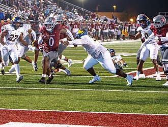 Virginia Union running back Curtis Allen (0) scores a touchdown as the Panthers defeated Johnson C. Smith University 28-10 in the Willard Bailey Classic on Saturday at Hovey Field.
