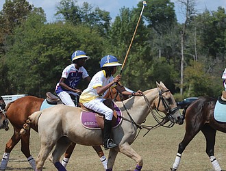 The Atlanta BEST Academy Polo Team competes against the Starr Creek Polo Club during the eighth annual Atlanta Polo Party last week.