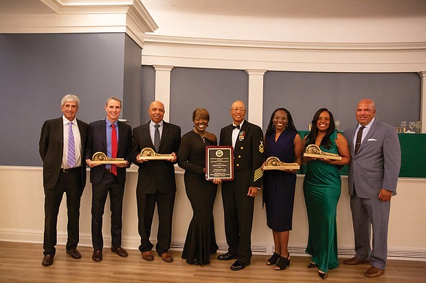 Serving with honors-The Black Tennis Hall of Fame Class of 2025 is recognized during the 17th annual induction ceremony Sept. 20
at the Virginia Museum of History & Culture in Richmond. Honorees are E. Lilyan Spencer, Junius Chatman, Traci Green, Mashona Washington, Dan Santorum and Donald E. Widener. Hall President and CEO Shelia Curry stands in the middle, with board members Irv Cantor, left, and David Harris, right.