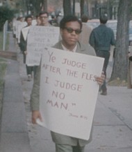 A still from restored Richmond Police Department surveillance footage shows protesters during the city’s civil rights era. The footage is part
of a collection highlighted in a virtual panel hosted by VCU Libraries.