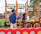 A young man dribbles a basketball during “Falling for the Culture: A Festival of Unity, Peace, and Hope” on Sunday in Jackson Ward.
