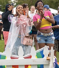 Pride in full color
Virginia PrideFest 2025 drew crowds to Midtown Green on West Leigh Street
on Saturday, Sept. 27, concluding a week of events organized by VA Pride. The festival featured all-day performances on two stages, along with vendors offering food and drinks. Kaila Robinson and Angelica Jackson enjoy a performance at the event by local cover band What’s Our Age Again? The festival featured all-day performances on two stages. (Julianne Tripp Hillian/Richmond Free Press)