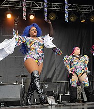 Pride in full color
Virginia PrideFest 2025 drew crowds to Midtown
Green on West Leigh Street on Saturday, Sept. 27, concluding a week of events organized by VA Pride. The festival featured all-day performances on two stages, along with vendors offering food and drinks. Godfrey’s Angels deliver an energetic performance. (Julianne Tripp Hillian/Richmond Free Press)