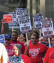 At a news conference Monday, Oct. 6, outside City Hall, dozens of educators, local lawmakers and community members rally to urge the Richmond School Board to reject a proposal that would roll back collective bargaining rights for Richmond Public Schools employees.