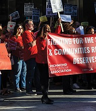 Dozens of educators, local lawmakers and community members rally to urge the Richmond School Board to reject a collective bargaining proposal. (Julianne Tripp Hillian/Richmond Free Press)