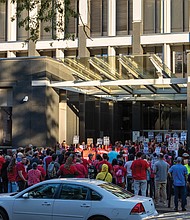 Dozens of educators, local lawmakers and community members rally to urge the Richmond School Board to reject a collective bargaining proposal. (Julianne Tripp Hillian/Richmond Free Press)