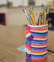 A cup of pencils sits on a classroom desk in Virginia.