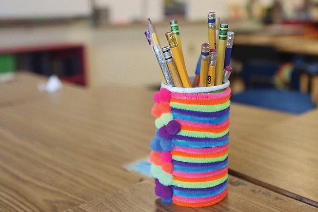 A cup of pencils sits on a classroom desk in Virginia.