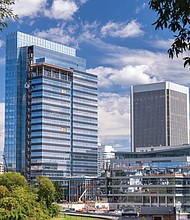 Cityscape slices of life and scenes in Richmond-CoStar Group’s new, 750,000-square-foot addition to its existing corporate campus overlooking the banks of the James River in downtown Richmond will feature a 26-story office tower and a six-story, multifunctional amenity building. CoStar’s expanded Richmond campus is expected to accommodate more than 3,000 CoStar employees in research, technology, operations, marketing and sales. It will also serve as a training site for the company’s fleet of drone pilots. (Julianne Tripp Hillian/Richmond Free Press)