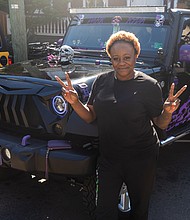 Fun first at Second-Street Festival-The 2nd Street Festival marked its 37th anniversary Oct. 4-5, filling Richmond’s historic Jackson Ward with
music, food and community spirit. The annual event celebrates the culture and legacy of Jackson Ward — once known as “the Harlem of the South” — and the neighborhood’s role as the heart of Richmond’s Black community. The free festival featured three stages of live entertainment, a Kidz Zone, food vendors, an Artists Row, and a marketplace showcasing local talent
and craftsmanship.Tina Braxton of SheJeepsRVA shows off her ride for fellow Jeep enthusiasts in the festival crowd on Saturday. SheJeepsRVA is a local group of women Jeep owners who gather for rides, community events and outreach. (Julianne Tripp Hillian/Richmond Free Press)