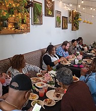 Food as Function-The local food scene took center stage at The Function, a barbecue and fish fry at Charlotte’s Southern Deli celebrating Virginia’s culinary heritage and the talents of Black chefs. Organized by Charlotte’s owners Nikki Gregory and Paul Polk with local food writer James L. Ford III, the event showcased Southern traditions reimagined by some of the area’s most creative culinary voices. Guests enjoy plates of barbecue and fish during The Function at Charlotte’s Southern Deli, an event spotlighting Virginia’s food traditions and Black chefs. (Sandra Sellars/Richmond Free Press)