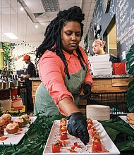 Food as Function-The local food scene took center stage at The Function,
a barbecue and fish fry at Charlotte’s Southern Deli celebrating Virginia’s culinary heritage and the talents of Black chefs. Organized by Charlotte’s owners Nikki Gregory and Paul Polk with local food writer
James L. Ford III, the event showcased Southern traditions reimagined by some of the area’s most creative culinary voices. Leah Branch was among
the featured chefs at the event in downtown Richmond. (Sandra Sellars/Richmond Free Press)