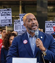 Delegate Mike Jones of the 77th District speaks at a rally outside City Hall. (Julianne Tripp Hillian/Richmond Free Press)