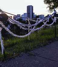 Honoring the Lost-On Oct. 2, 1925, a 200-foot section of Richmond’s Church Hill Tunnel collapsed during a railway upgrade, burying a work train and killing at least four men. Two laborers were never recovered, and the tunnel was later sealed, leaving the site unstable. On Oct. 2, the Friends of Jefferson Park and the Church Hill Association held a commemoration
to honor those lost and mark a century since the tragedy. Multiple markers were placed along the sidewalk of Jefferson Park honoring the men who died in the Church Hill Tunnel collapse. (Julianne Tripp Hillian/Richmond Free Press)