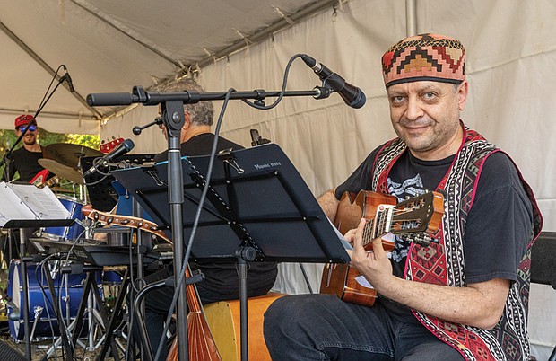A Taste of Armenia-Richmond’s oldest and longest-running food festival returned Friday, Oct. 3, as St. James Armenian Church on the corner of Patterson and Pepper hosted its annual Armenian Food Festival. The two-day event brought the community together for authentic Armenian cuisine, from savory kebabs to sweet pastries. The festival showcased not just food, but the warmth of a community keeping its rich cultural traditions alive. Avetik Topchyan performs traditional Armenian music with Hooshere and the VA Roonks. (Julianne Tripp Hillian/Richmond Free Press)