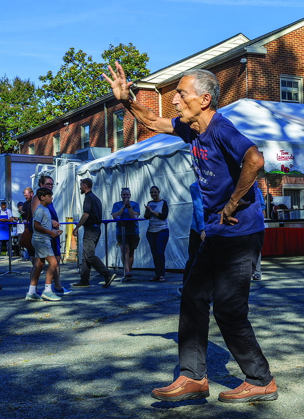 A Taste of Armenia-Richmond’s oldest and longest-running food festival returned Friday, Oct. 3, as St. James Armenian Church on the corner of Patterson and Pepper hosted its annual Armenian Food Festival. The two-day event brought the community together for authentic Armenian cuisine, from savory kebabs to sweet pastries. The festival showcased not just food, but the warmth of a community keeping its rich cultural traditions alive. Gro Hovhannsyan dances to music by the band Hooshere and the VA Roonks at the event. (Julianne Tripp Hillian/Richmond Free Press)