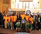 Recent graduates gather Friday for a group photo during the ceremony marking the completion of the city’s first community-based workforce development program, a partnership between the City of Richmond, LIUNA and Kirila Construction Services.